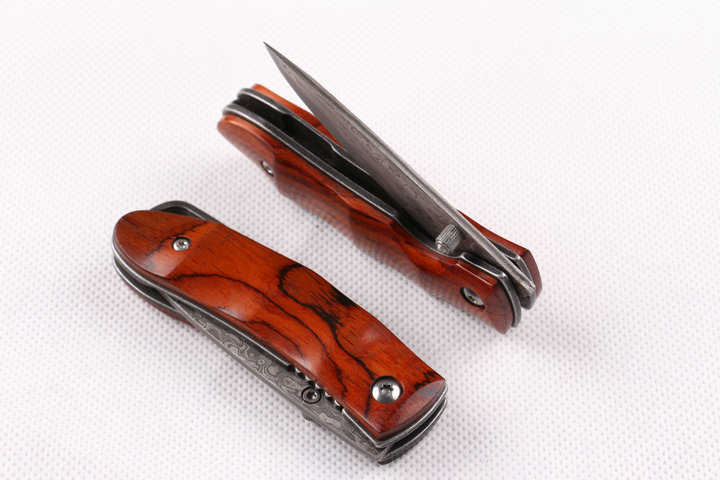 Damascus.Small mountain folding knife UD402343